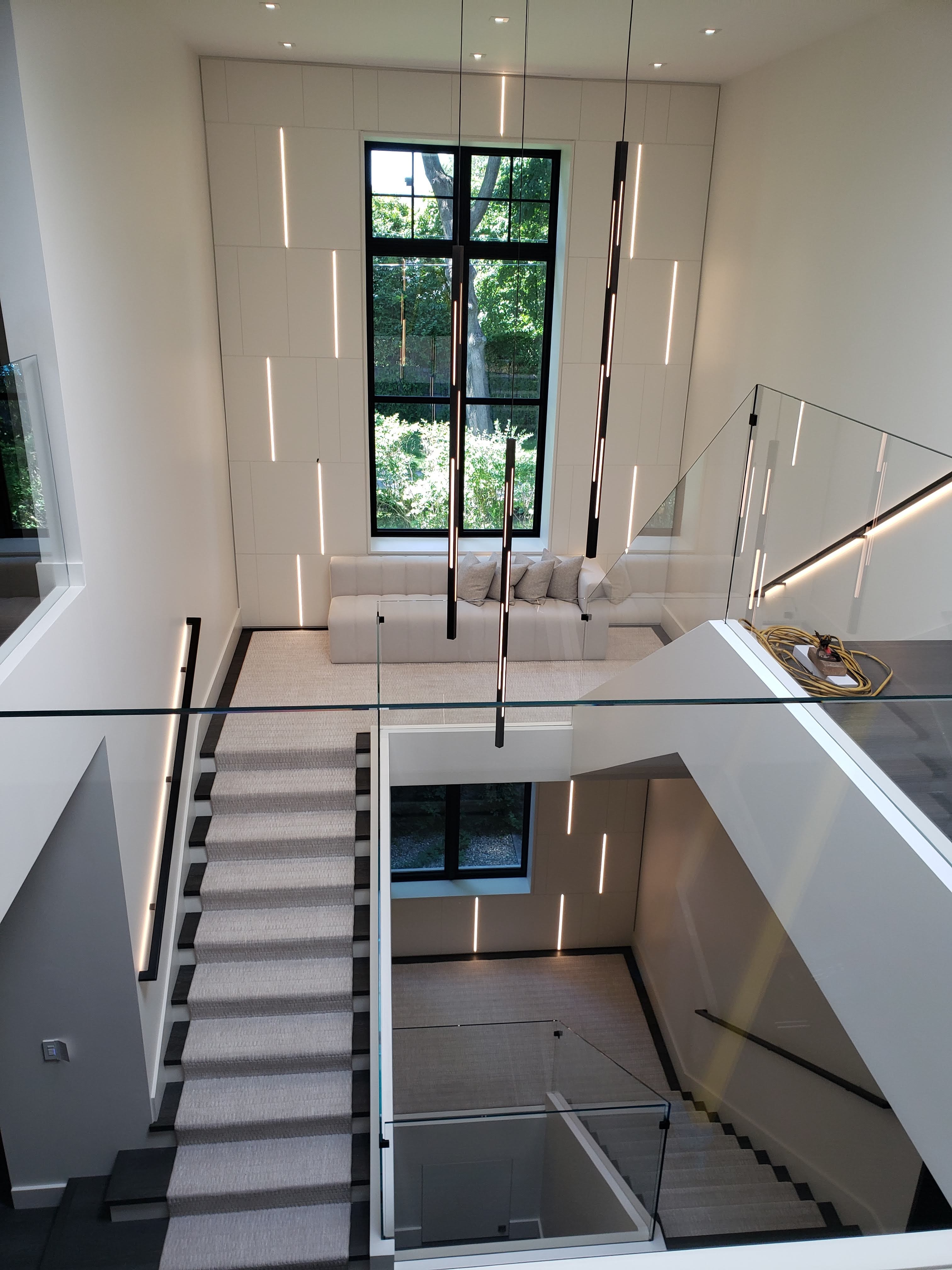 Architectural lighting across multiple levels of a Hampstead residence