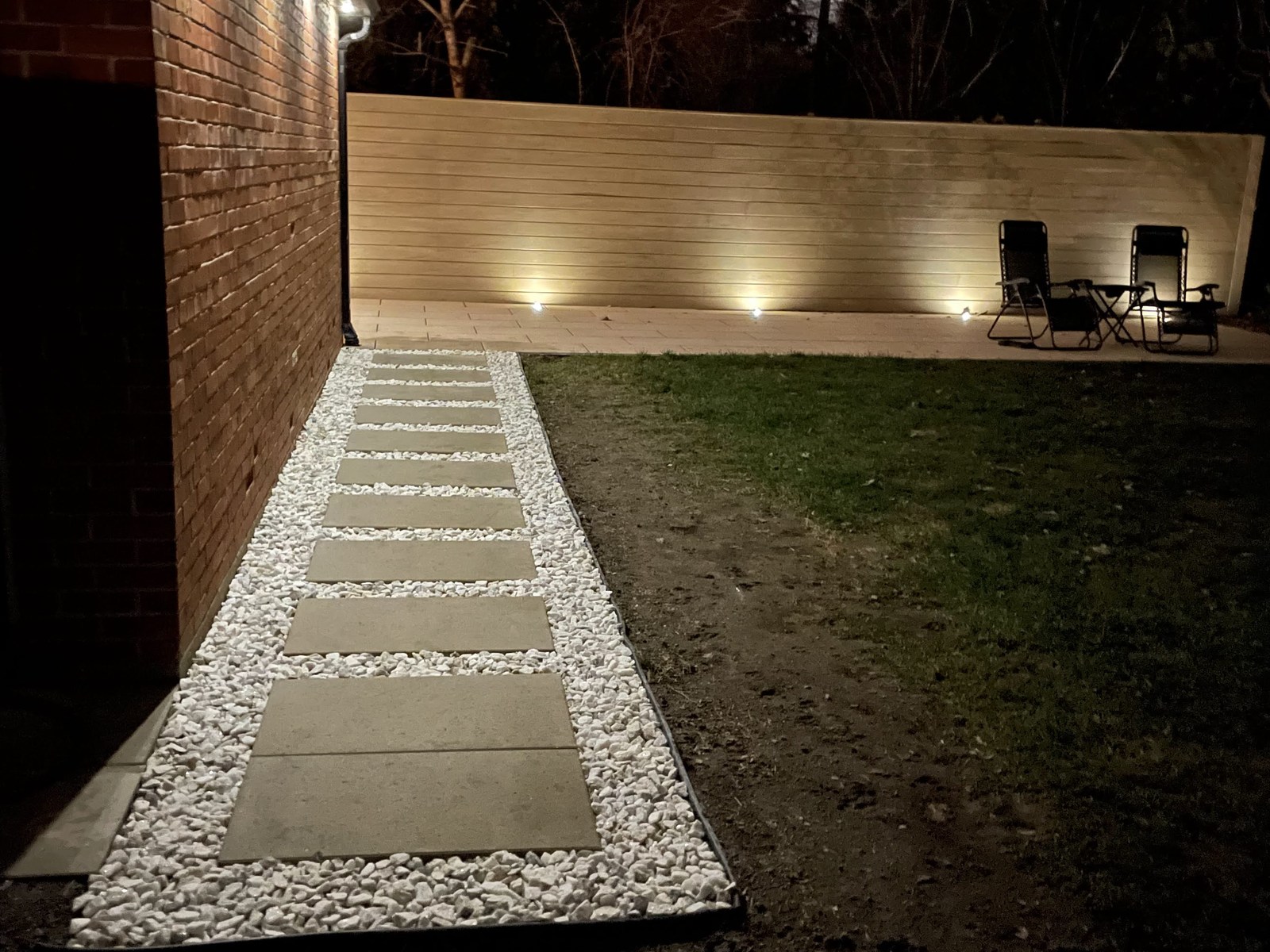 Exterior lighting along a residential pathway in Hampstead