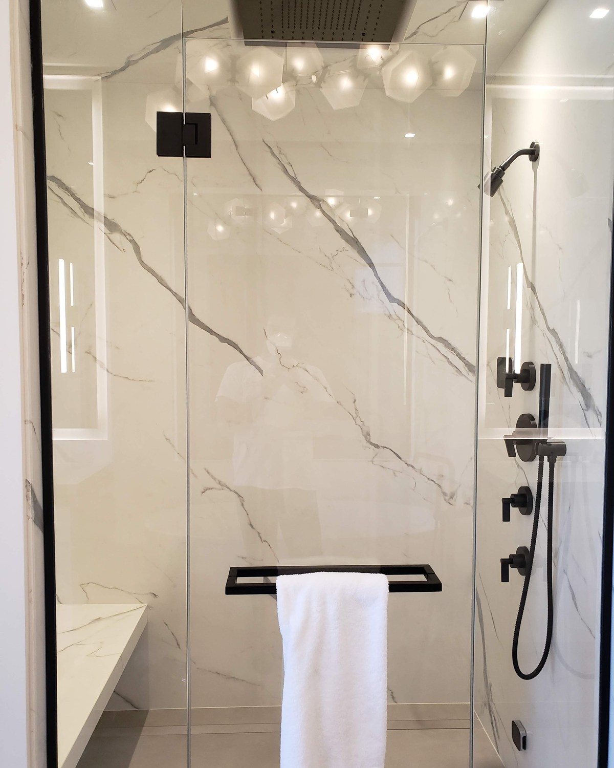 Integrated lighting in a residential shower in Hampstead